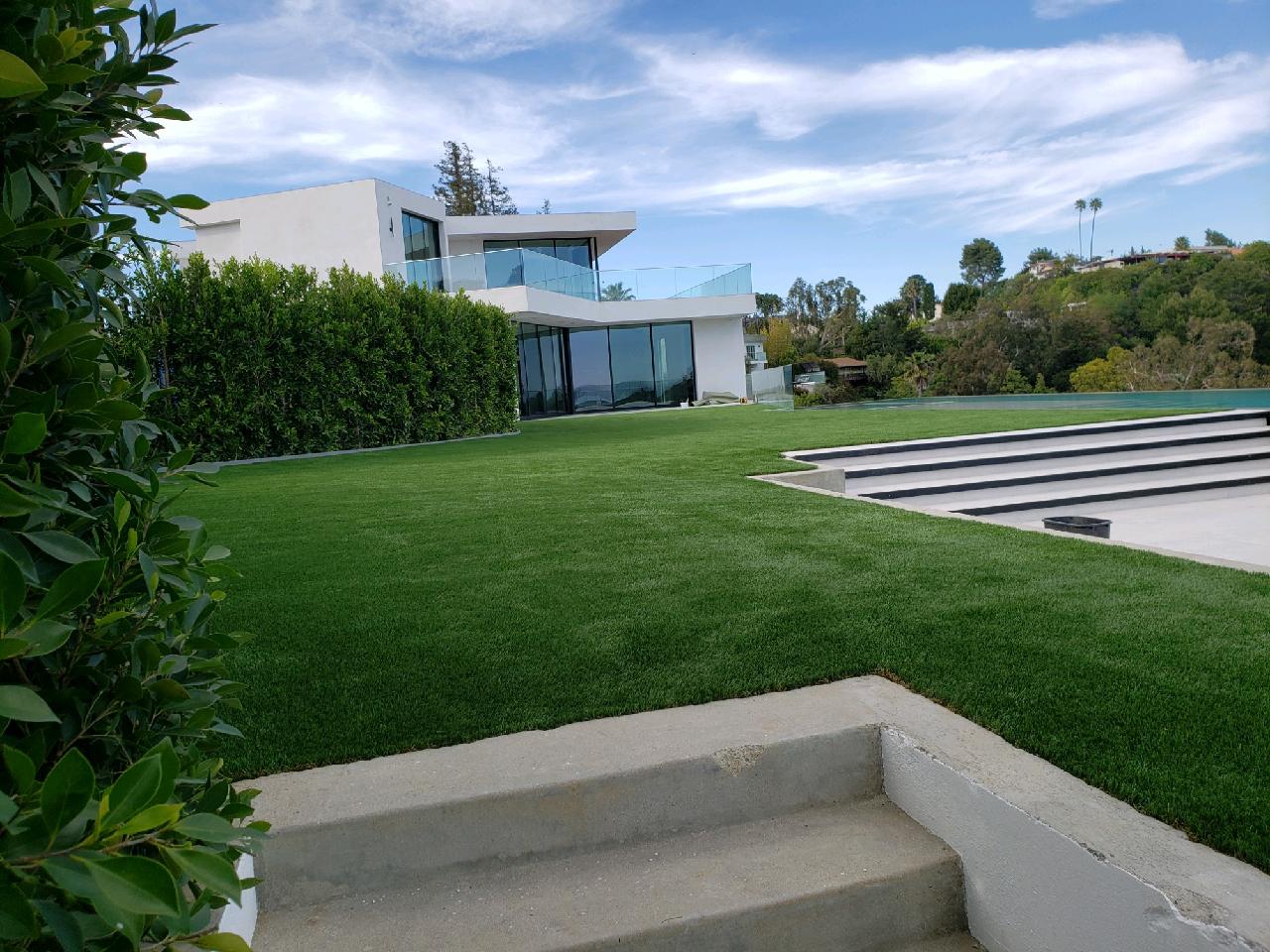 Escondido, CA modern home with landscape turf.
