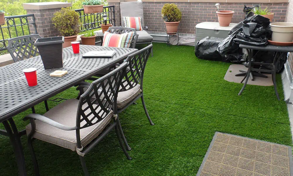 patio turf with a table and red cups